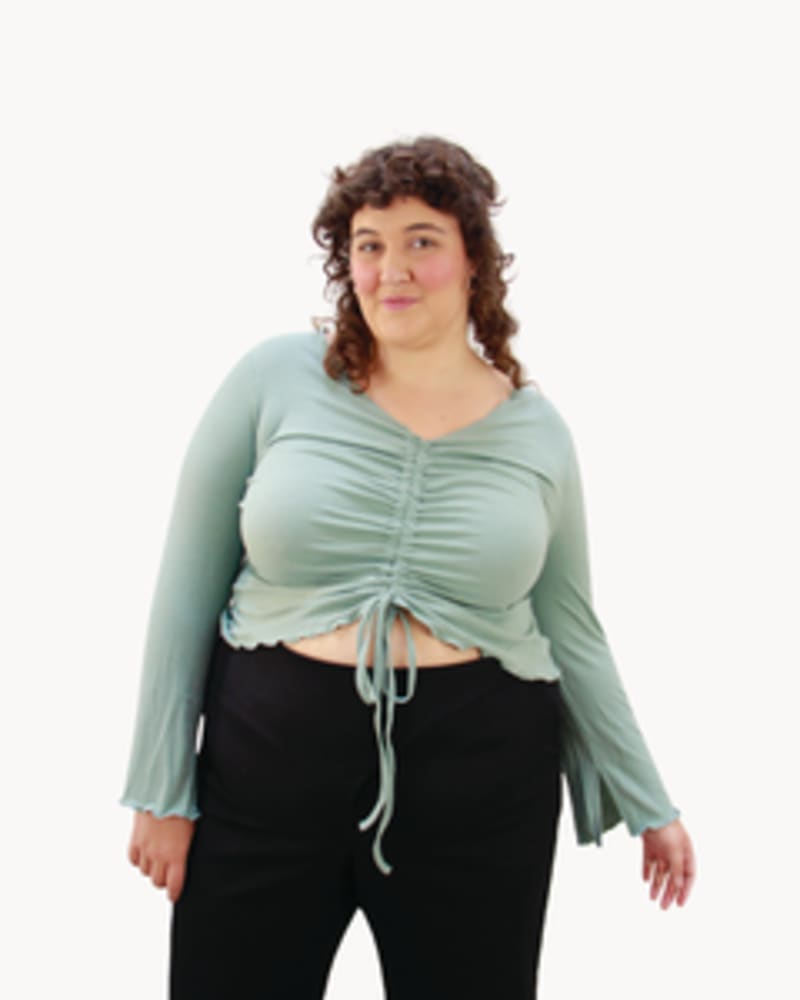 Front of a model wearing a size L Addy Ruched Top in SAGE by Lovefool. | dia_product_style_image_id:249709